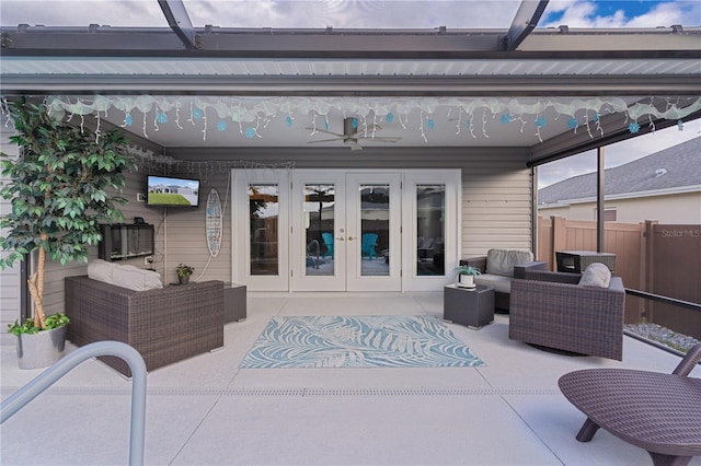 view of patio with french doors, an outdoor hangout area, and ceiling fan