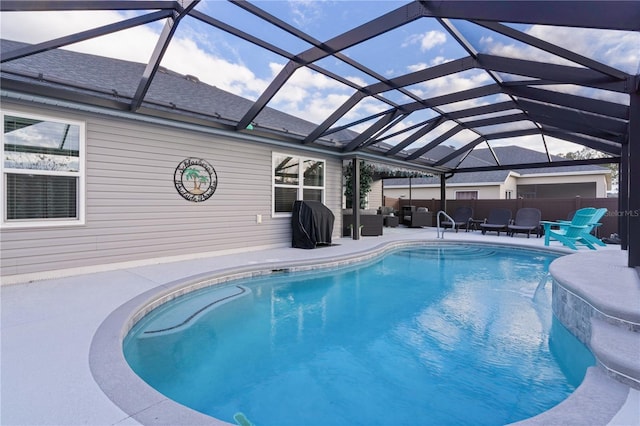 view of swimming pool featuring outdoor lounge area, a patio area, grilling area, and a lanai