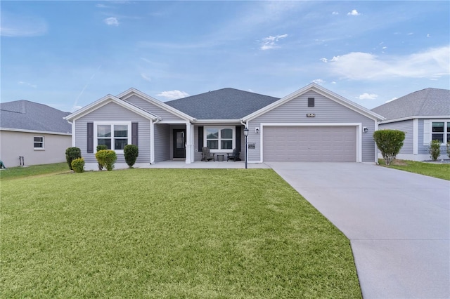 single story home featuring a front yard and a garage