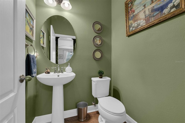 bathroom with sink and toilet