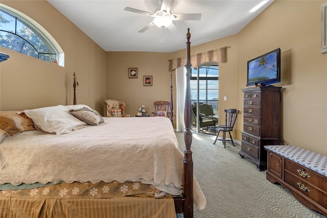 bedroom featuring ceiling fan and light carpet