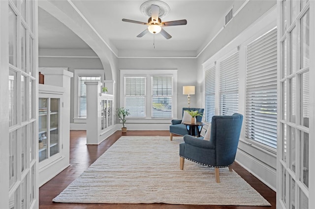 living area featuring french doors, dark hardwood / wood-style floors, and ceiling fan