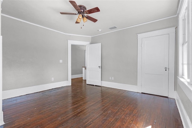 interior space featuring crown molding, ceiling fan, and dark wood-type flooring