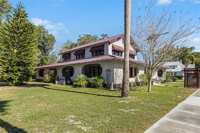 view of front of home featuring a front yard