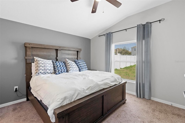 carpeted bedroom featuring ceiling fan and lofted ceiling