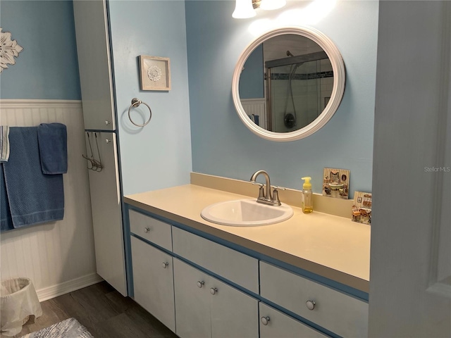 bathroom featuring vanity and hardwood / wood-style flooring