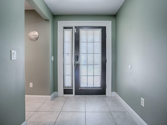 view of tiled foyer entrance