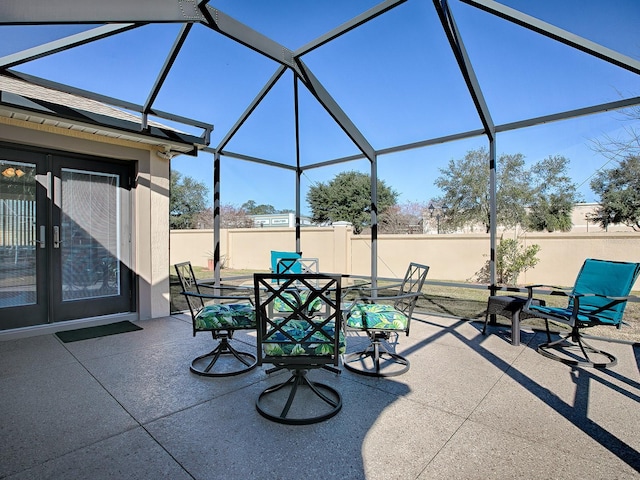 view of patio with a lanai