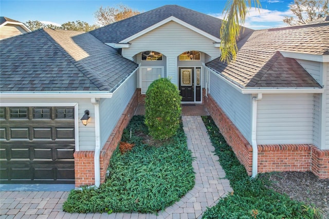 view of front of property featuring a garage