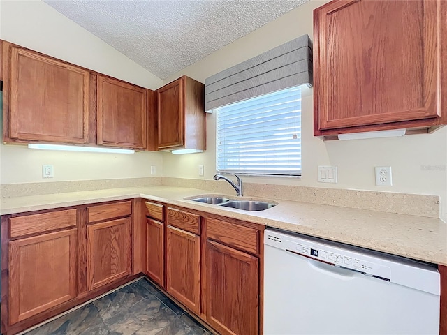 kitchen with a textured ceiling, white dishwasher, lofted ceiling, and sink