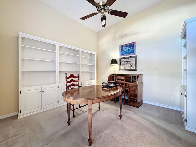 office featuring light carpet and ceiling fan