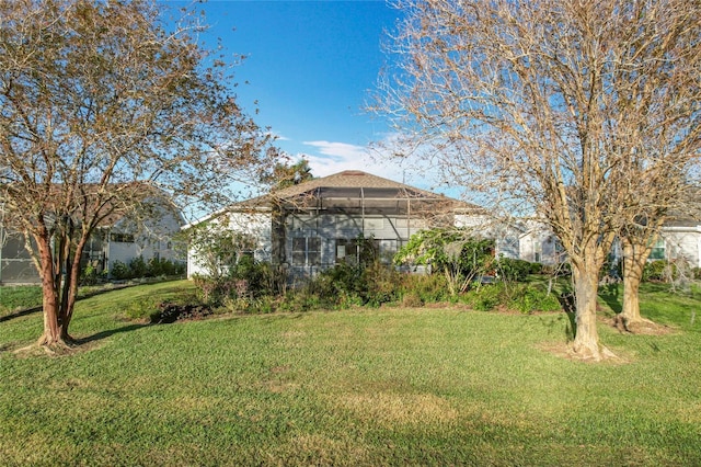 view of yard featuring a lanai