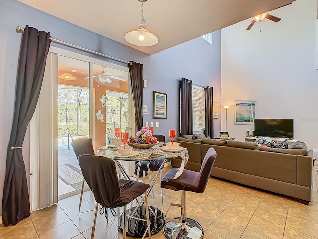 dining room featuring light tile patterned floors and ceiling fan