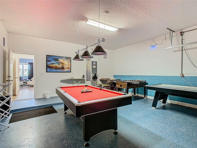 rec room featuring a textured ceiling and billiards