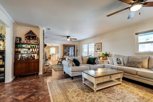 living room featuring ceiling fan and ornamental molding