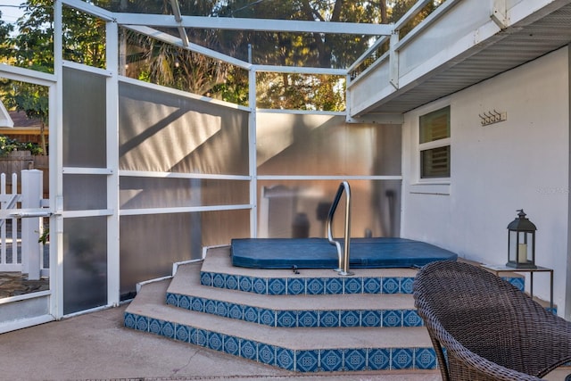 view of patio / terrace with a jacuzzi