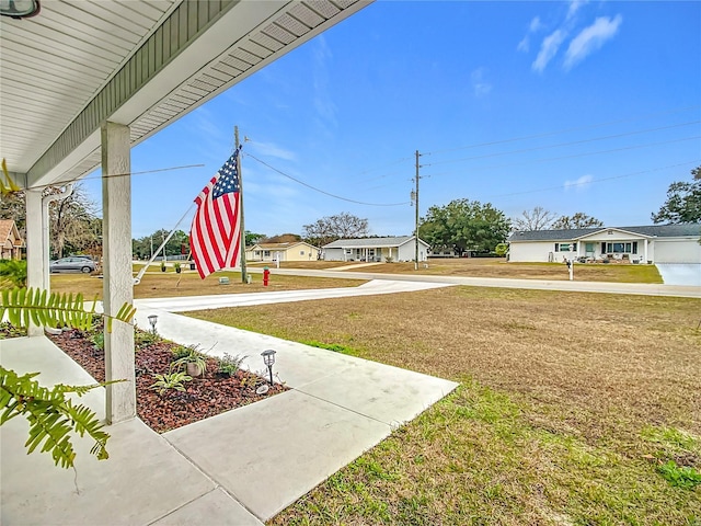 view of yard with a porch