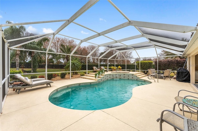 view of pool featuring a lanai and a patio area