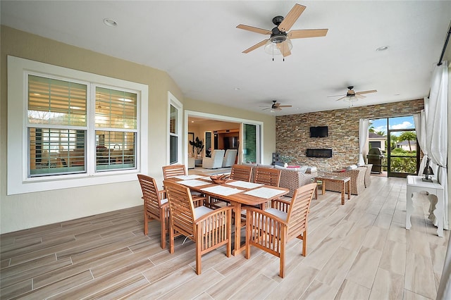 exterior space featuring light hardwood / wood-style flooring and ceiling fan