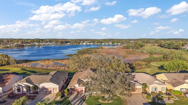 aerial view with a water view and a residential view