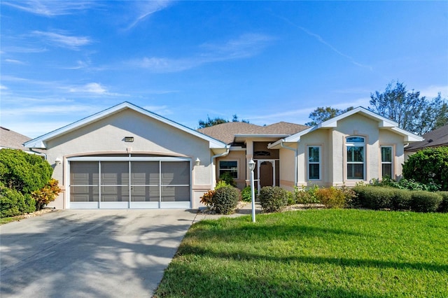 ranch-style home with a front lawn and a garage