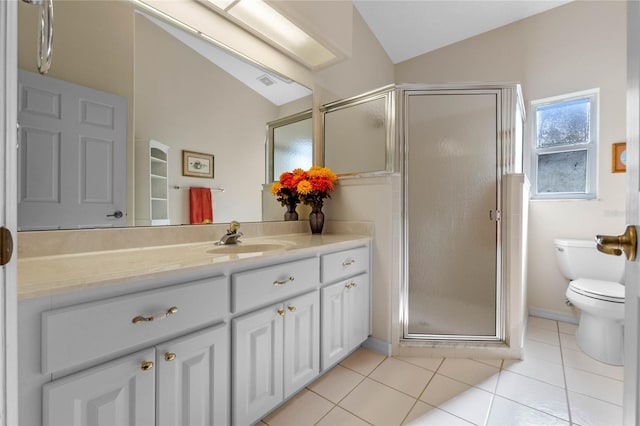 bathroom with tile patterned flooring, lofted ceiling, a shower with door, and vanity