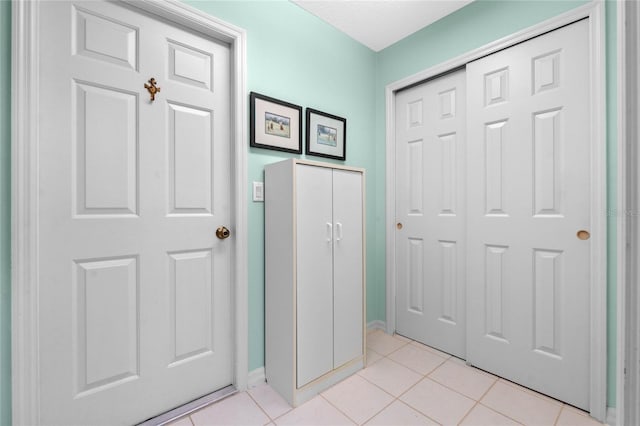 interior space featuring light tile patterned floors