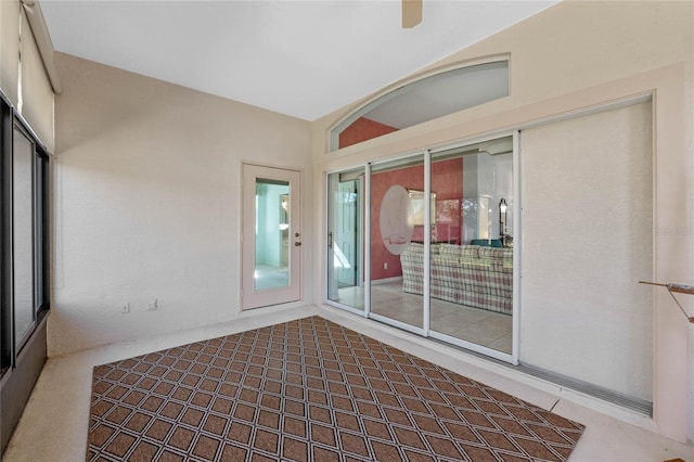 unfurnished sunroom with vaulted ceiling