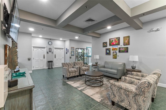 living room featuring beam ceiling