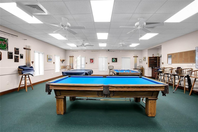 game room with ceiling fan, a drop ceiling, and pool table