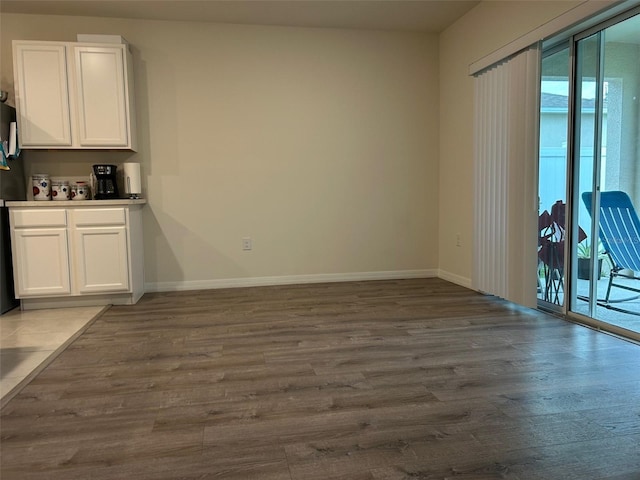 interior space with dark hardwood / wood-style floors