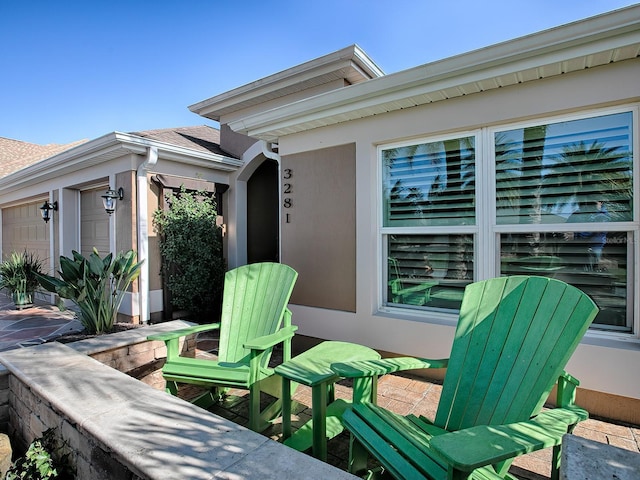 view of patio with a garage