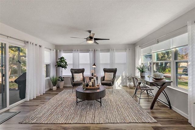 sunroom / solarium with ceiling fan