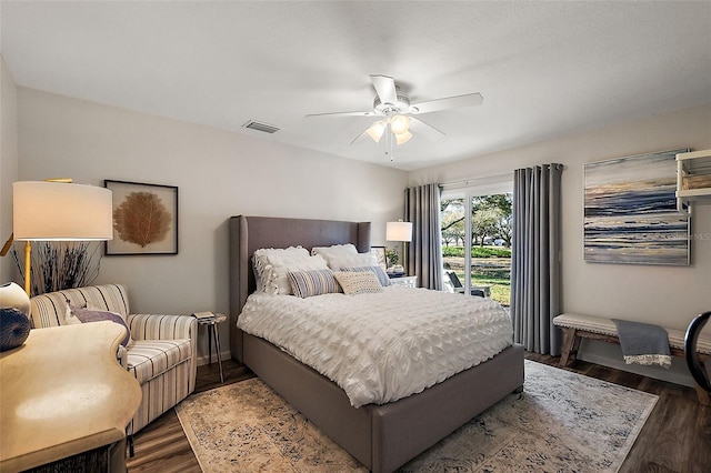 bedroom featuring dark wood-type flooring and ceiling fan