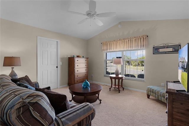 living room featuring ceiling fan, light colored carpet, and lofted ceiling