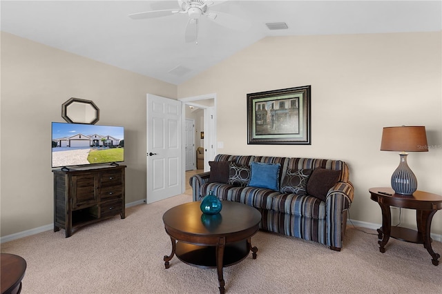 living room with ceiling fan, light carpet, and vaulted ceiling