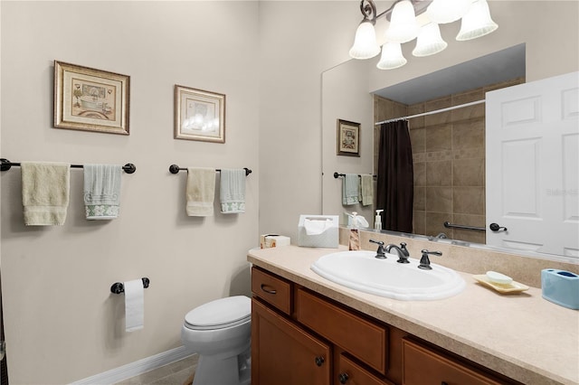 bathroom featuring toilet, vanity, tile patterned flooring, and curtained shower