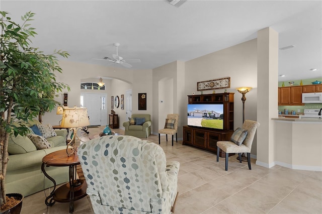 living room featuring ceiling fan and light tile patterned flooring