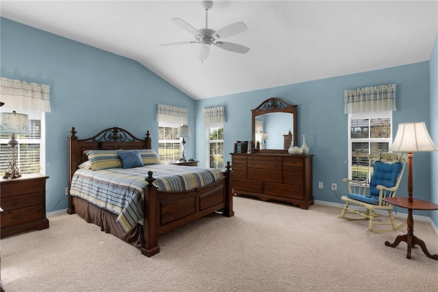 carpeted bedroom featuring ceiling fan and lofted ceiling