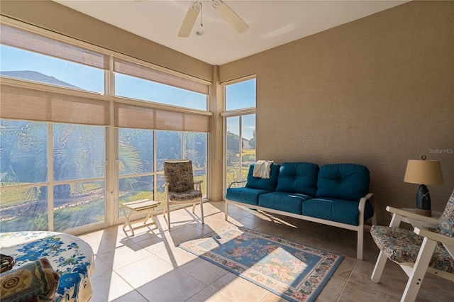 sunroom / solarium with ceiling fan