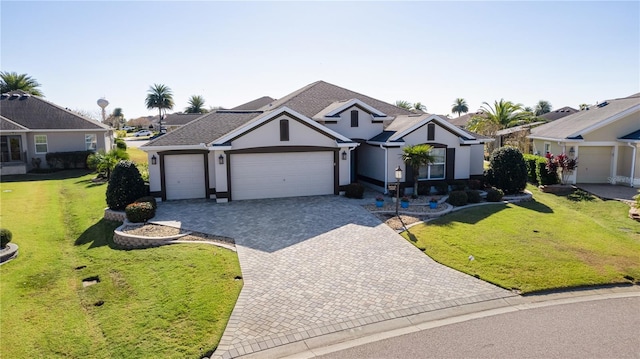 ranch-style home with a garage and a front yard