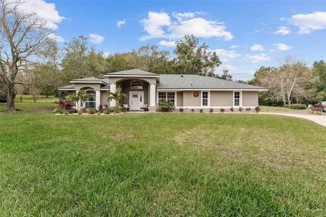 view of front of home with a front yard