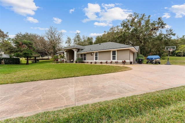 single story home with a front lawn