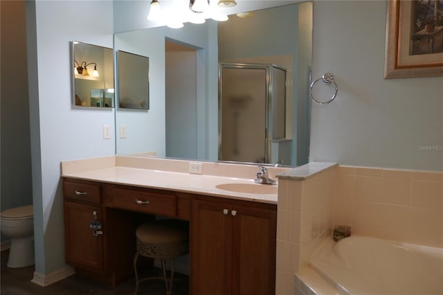 full bathroom with vanity, toilet, and independent shower and bath