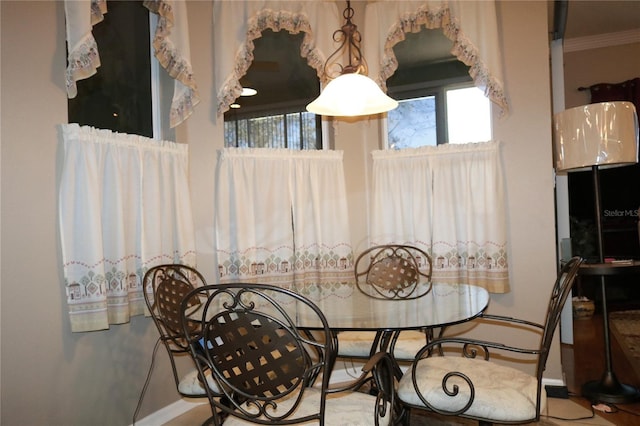 dining room featuring ornamental molding