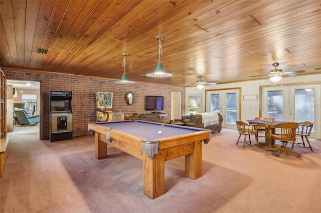 recreation room with french doors, wood ceiling, brick wall, billiards, and carpet floors