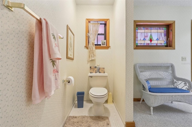 bathroom featuring tile patterned floors and toilet