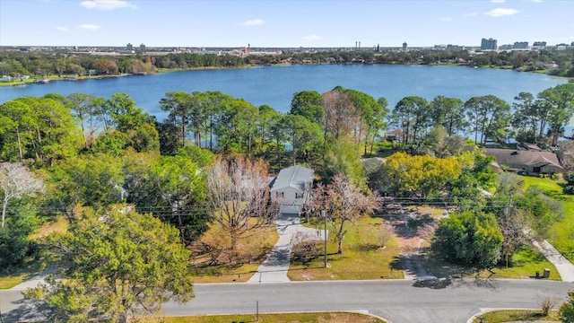 birds eye view of property featuring a water view