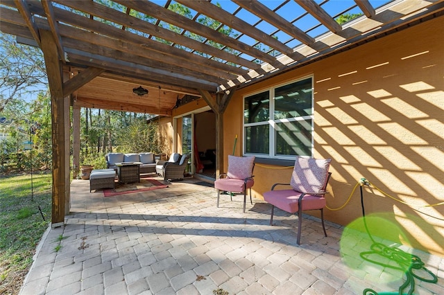 view of patio / terrace with an outdoor hangout area and a pergola