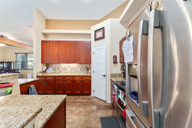 kitchen with stainless steel refrigerator with ice dispenser, light stone counters, and tasteful backsplash